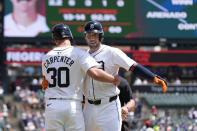 Detroit Tigers' Matt Vierling is greeted by Kerry Carpenter after hitting a two-run home run during the third inning of a baseball game against the St. Louis Cardinals, Wednesday, May 1, 2024, in Detroit. (AP Photo/Carlos Osorio)