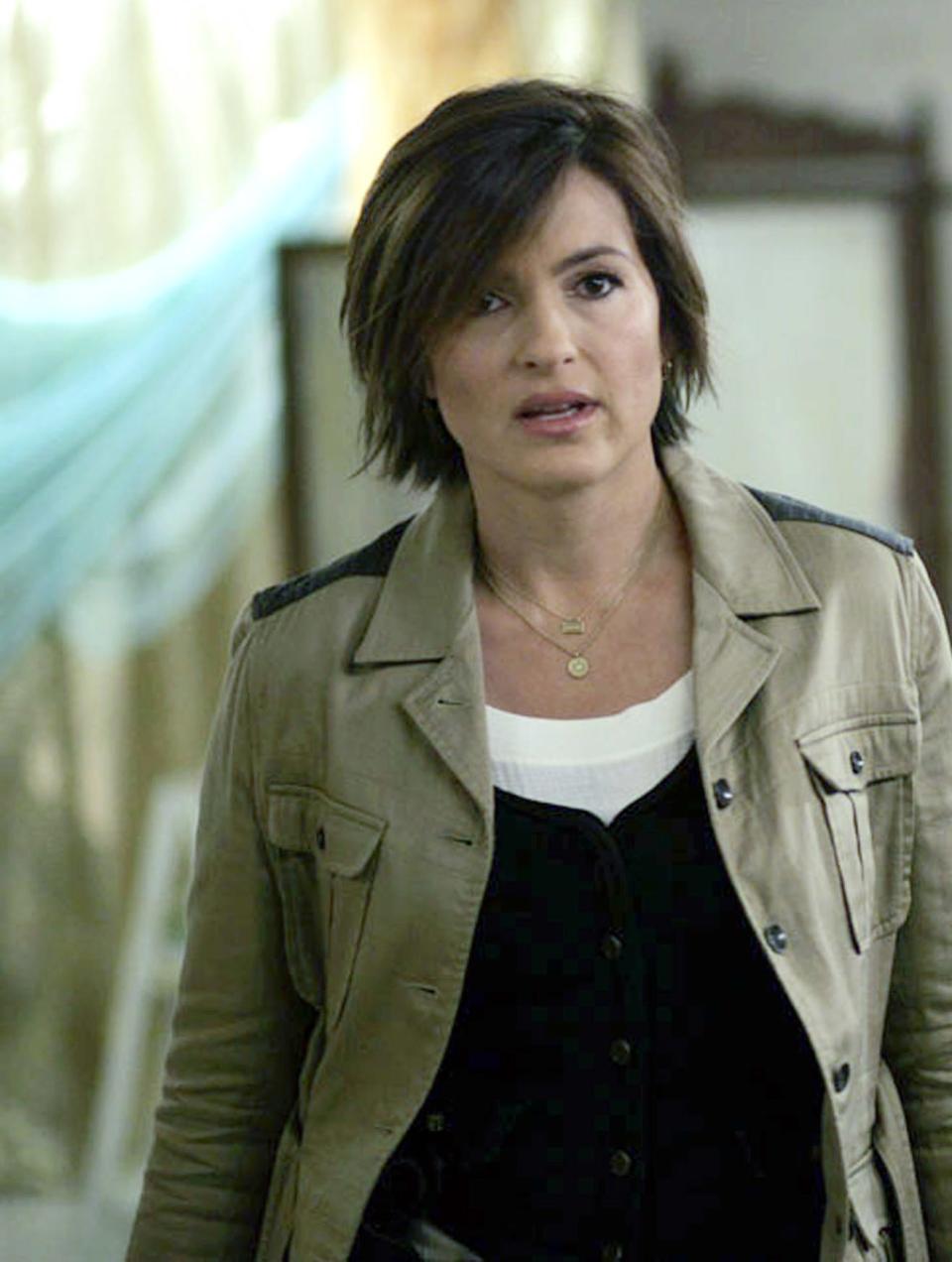 Mariska Hargitay in a scene from Law & Order: SVU, dressed in business casual attire