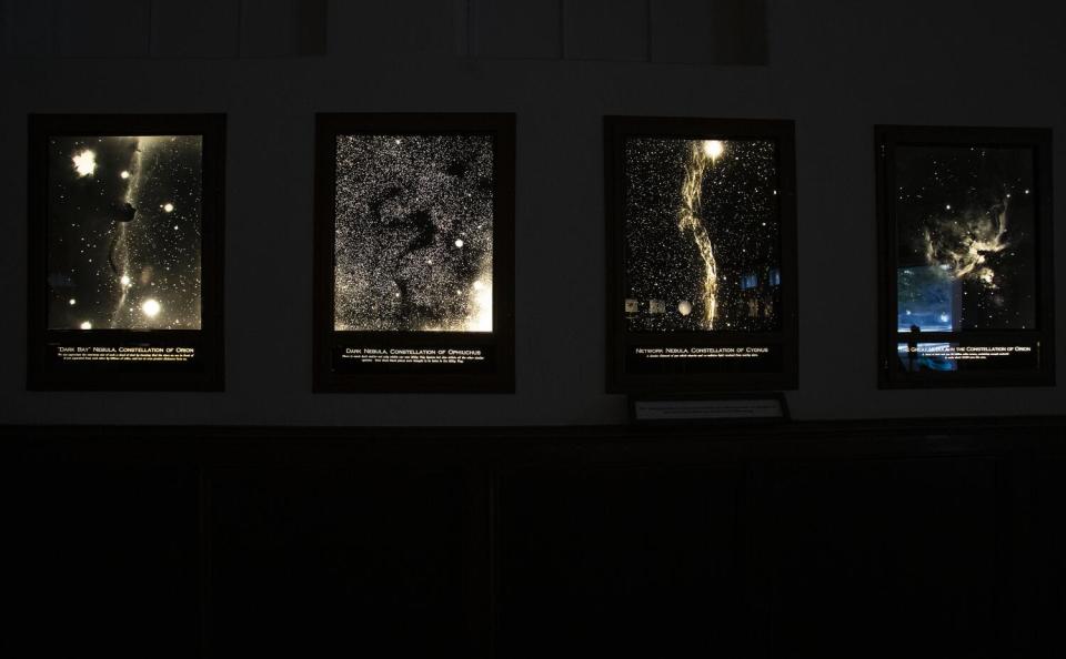 High-quality photographs of constellations hang on the walls inside the Astronomical Museum at Mt. Wilson Observatory.