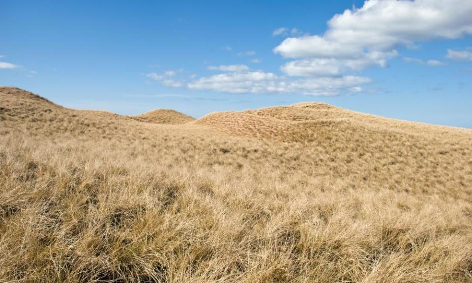 Sand dunes of Sandwood Bay Scotland taken on sunny day with blue sky