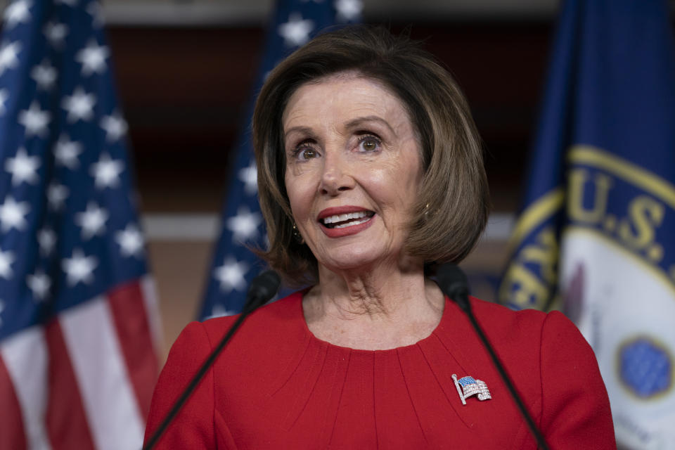 Speaker of the House Nancy Pelosi, D-Calif., talks to reporters on the morning after the first public hearing in the impeachment probe of President Donald Trump on his effort to tie U.S. aid for Ukraine to investigations of his political opponents, on Capitol Hill in Washington, Thursday, Nov. 14, 2019. Pelosi says the president's actions in the impeachment inquiry amount to "bribery." (AP Photo/J. Scott Applewhite)