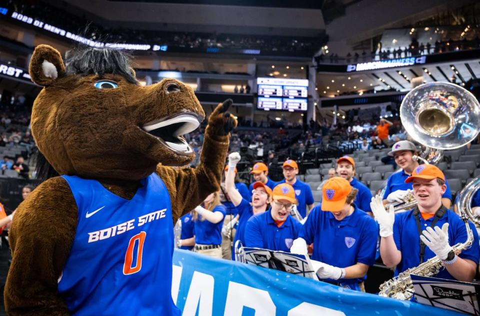 Buster the Boise State Bronco hypes up the band before the school takes on the Northwestern Wildcats at the NCAA Tournament at Golden 1 Center on Thursday.