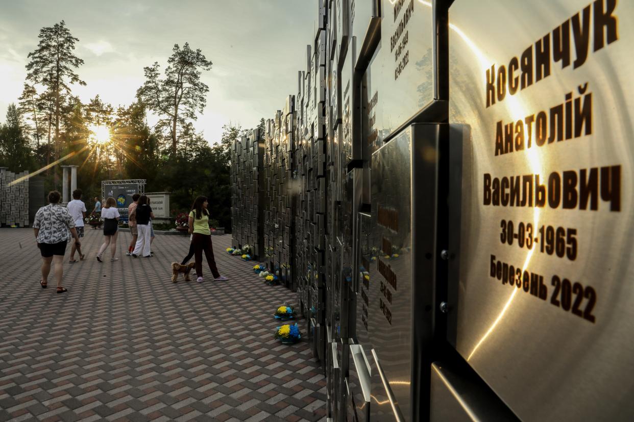 A memorial with the names of 501 identified in Bucha (EPA)