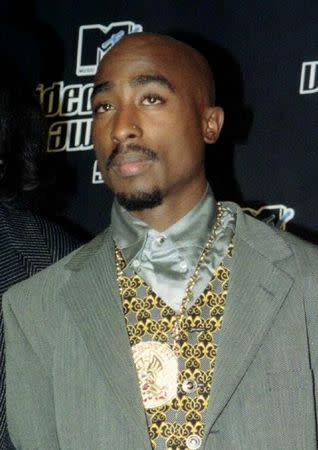 FILE PHOTO 4SEP96 - Rap music star Tupac Shakur died September 13, six days after being shot four times while riding in a car in Las Vegas. Shakur had been in critical condition since he was shot and had a lung removed in one of two operations. Shakur is shown here at the MTV Music Video Awards in New York September 4. CRIME SHAKUR