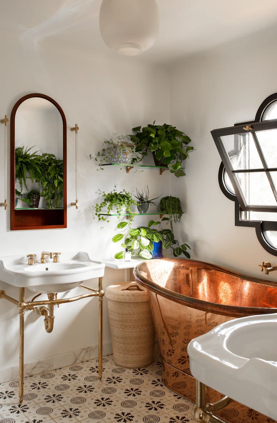 a tilting window in this 1930s bathroom updated by sarah solis tub signature hardware sink waterworks mirror custom tile tabarka studio