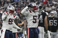 New England Patriots linebacker Josh Uche (55) reacts after sacking Las Vegas Raiders quarterback Derek Carr during the second half of an NFL football game between the New England Patriots and Las Vegas Raiders, Sunday, Dec. 18, 2022, in Las Vegas. (AP Photo/David Becker)