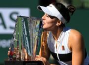 Mar 17, 2019; Indian Wells, CA, USA; Bianca Andreescu (CAN) with the championship trophy after defeating Angelique Kerber (not pictured) in the final match of the BNP Paribas Open at the Indian Wells Tennis Garden. Mandatory Credit: Jayne Kamin-Oncea-USA TODAY Sports