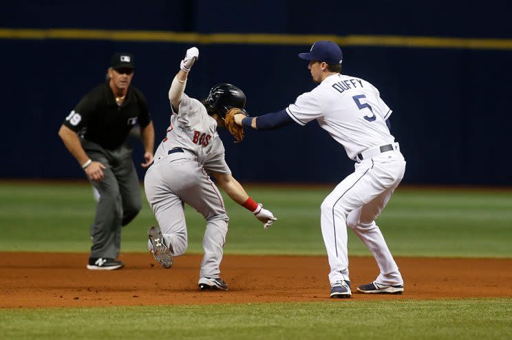 ST. PETERSBURG, FL - AUGUST 24: Shortstop Matt Duffy #5 of the Tampa Bay Rays tags out Andrew Benintendi #40 of the Boston Red Sox after Dustin Pedroia grounded into the double play during the seventh inning of a game on August 24, 2016 at Tropicana Field in St. Petersburg, Florida. (Photo by Brian Blanco/Getty Images)