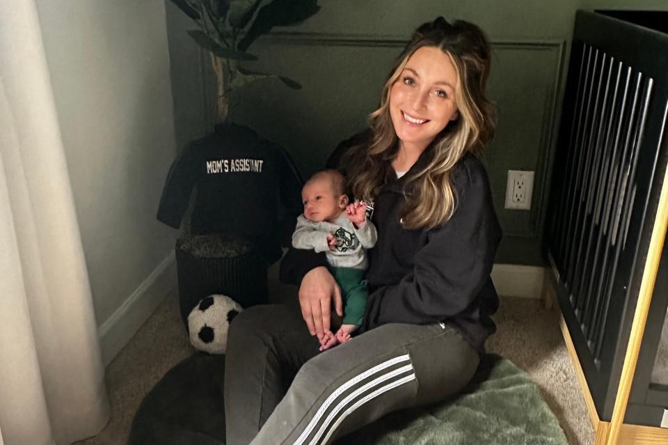 Boylan's girls soccer head coach Taylor Meyers holds her newborn, Brooks Lay, in their South Beloit home shortly after he was born on Friday, April 19, 2024.