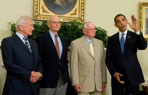 US President Barack Obama talks with the first man on the moon Neil Armstrong (2nd R), and fellow Apollo 11 crewmembers Edwin "Buzz" Aldrin (L) and Michael Collins at the White House on the 40th anniversary of the first human landing on the moon, July 20, 2009. Armstrong has died following complications from cardiovascular surgery. He was 82