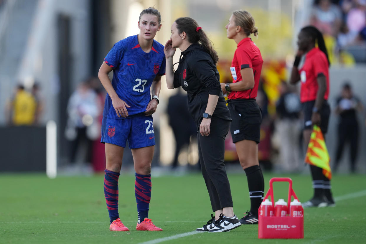 SAN DIEGO, CALIFORNIA - OCTOBER 29: United States interim head coach Twila Kilgore talks with Emily Fox #23 during the second half of an international friendly against Colombia at Snapdragon Stadium on October 29, 2023 in San Diego, California. (Photo by Brad Smith/ISI Photos/USSF/Getty Images for USSF)