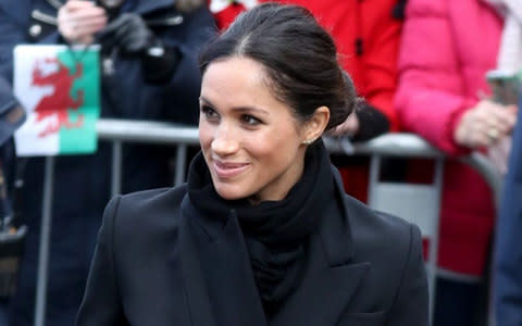  Meghan Markle arrives to a walkabout at Cardiff Castle - Credit: Chris Jackson /Getty