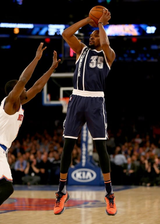 Kevin Durant of the Oklahoma City Thunder takes a shot in the first half against the New York Knicks, at Madison Square Garden in New York, on January 26, 2016