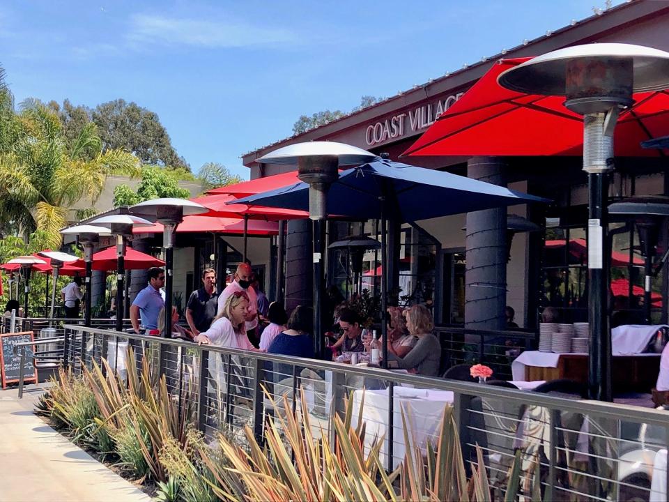 People drinking wine outside in Montecito