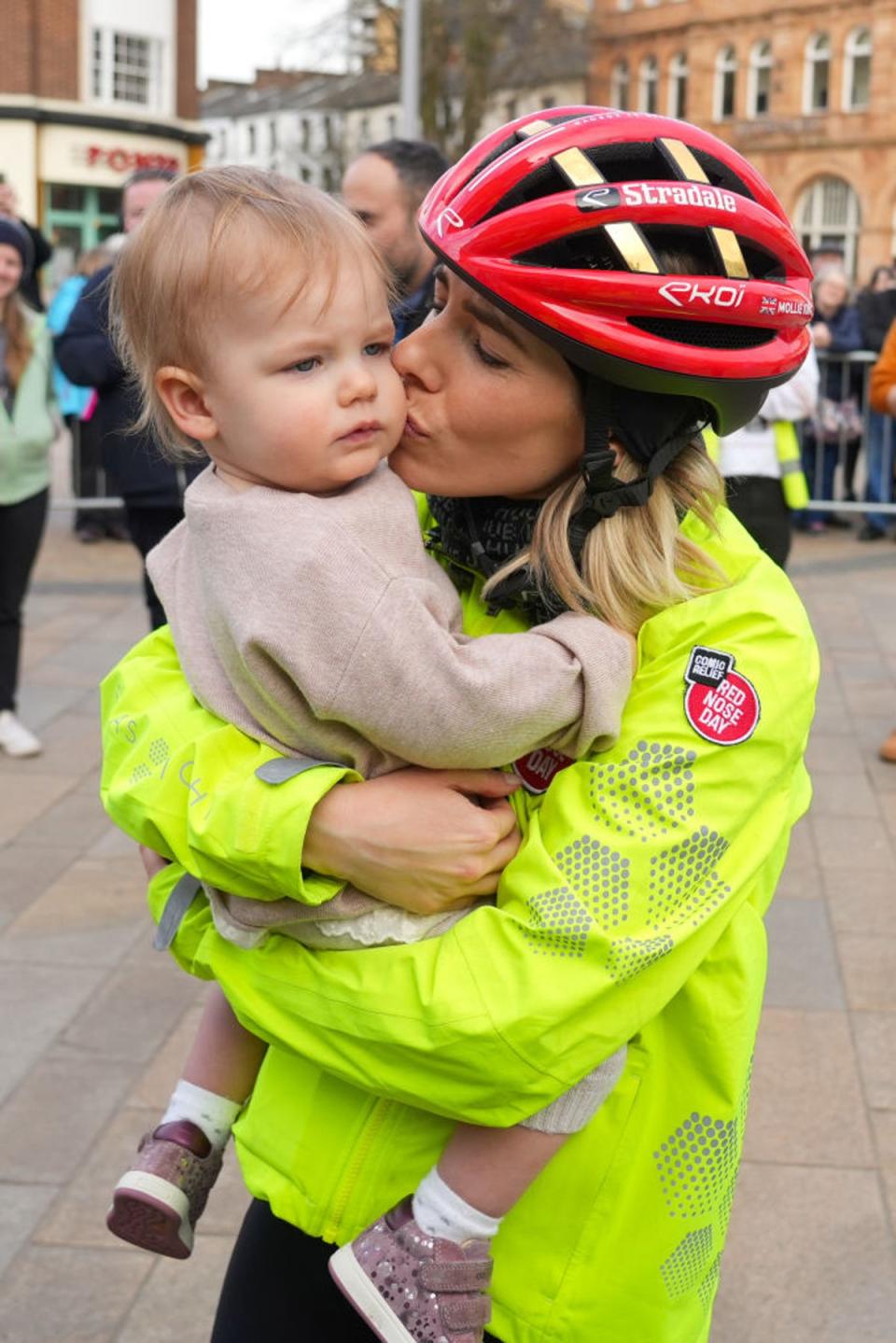 Mollie King planted a huge kiss on one-year-old daughter Annabella’s cheek (Dominic Lipinski/Getty Images)