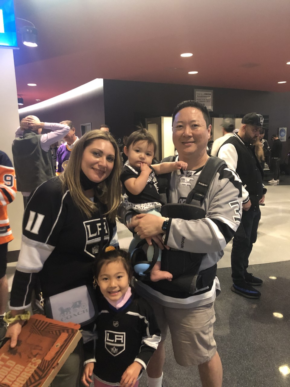 Kings fans Arthur Whang, his wife Lindsey and daughters Charlotte and Penelope.