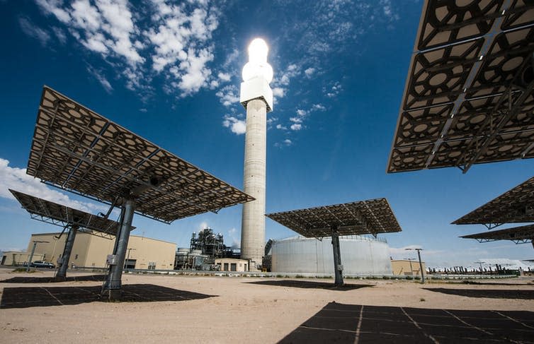 <span class="caption">A concentrated solar power plant.</span> <span class="attribution"><a class="link " href="https://ccsearch.creativecommons.org/photos/dc78aa89-9041-4054-aaf4-c0c8c1350b77" rel="nofollow noopener" target="_blank" data-ylk="slk:National Renewable Energy Lab;elm:context_link;itc:0;sec:content-canvas">National Renewable Energy Lab</a>, <a class="link " href="http://creativecommons.org/licenses/by-nc-nd/4.0/" rel="nofollow noopener" target="_blank" data-ylk="slk:CC BY-NC-ND;elm:context_link;itc:0;sec:content-canvas">CC BY-NC-ND</a></span>