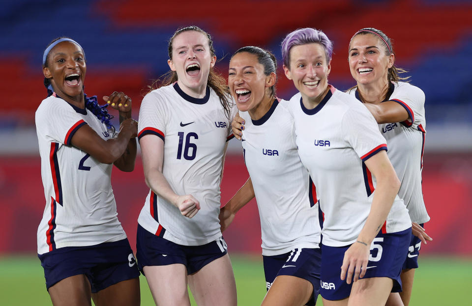 Crystal Dunn #2, Rose Lavelle #16, Christen Press #11, Megan Rapinoe #15 and Alex Morgan #13 of Team United States celebrate following their team's victory over Netherlands on July 30. (Laurence Griffiths/Getty Images)