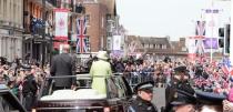 Britain's Queen Elizabeth is driven through Windsor in an open top Range Rover with Prince Philip on her 90th Birthday, in Windsor, Britain April 21, 2016. REUTERS/John Stillwell/Pool