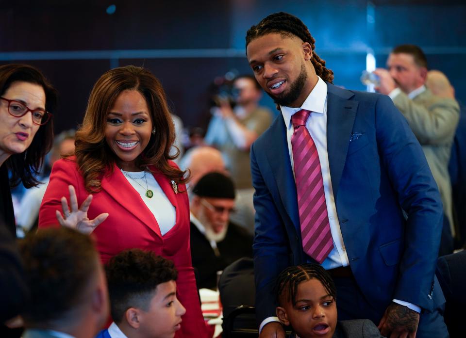 Rep. Sheila Cherfilus-McCormick, D-FLa., greets Buffalo Bills safety Damar Hamlin at an event in Washington, D.C., advocating for legislation the congresswoman introduced to provide money for AEDs and training in schools. March 29, 2023.