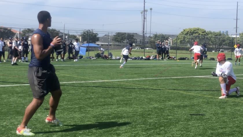 D.J. Uiagalelei of St. John Bosco looks down field during the 2019 Edison passing tournament.