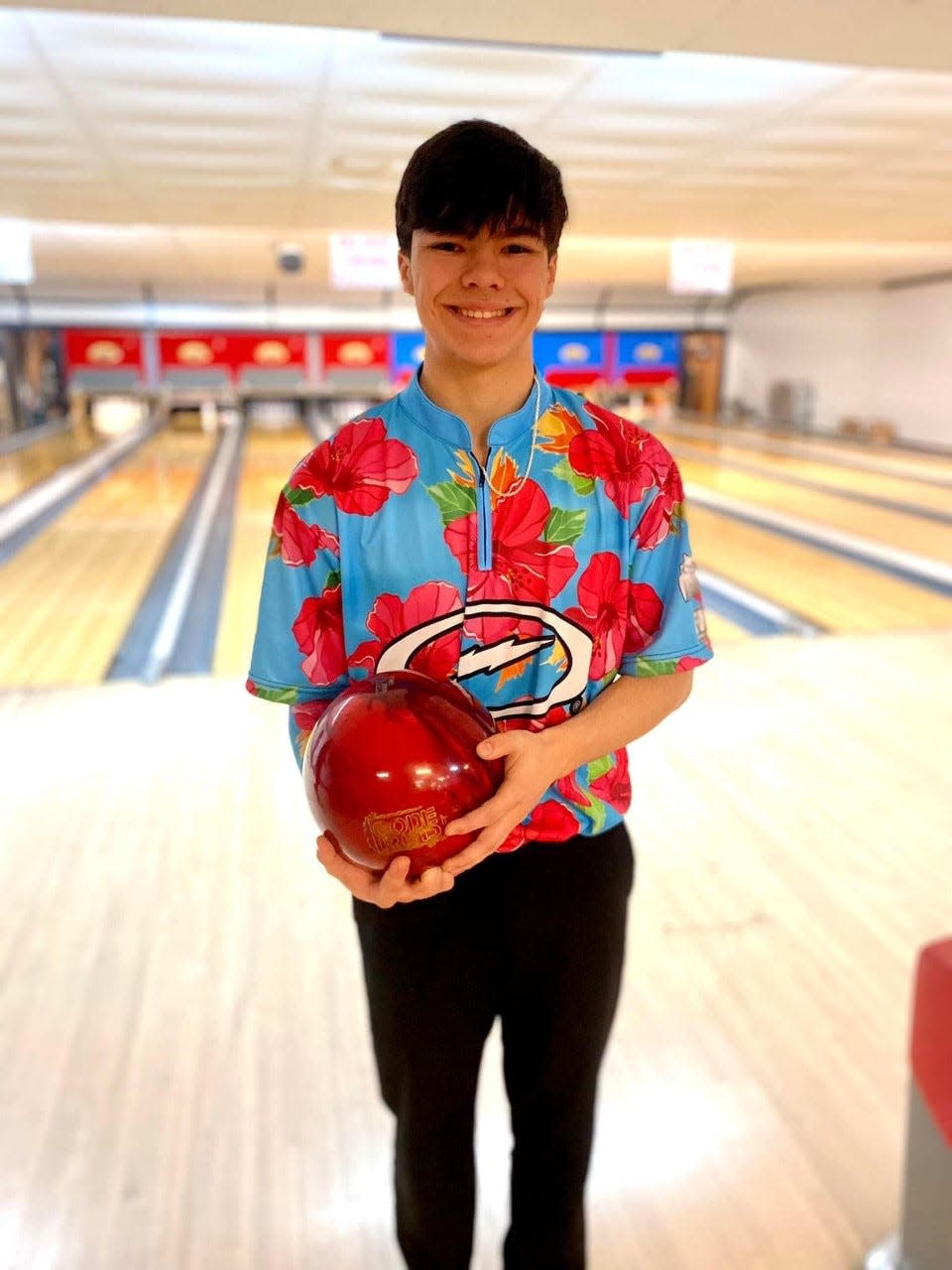 Heath junior Bryce Holmes bowled his first perfect game on Sunday at Village Lanes.