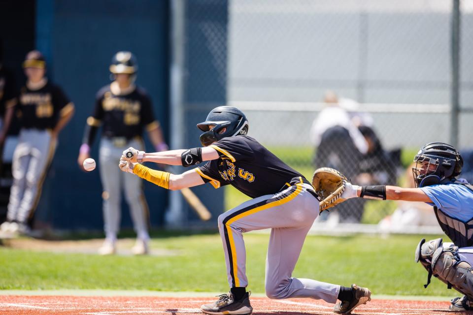 Roy’s Cam Baty bunts the ball against Westlake during the first round of the 6A boys baseball state playoffs at Westlake High School in Saratoga Springs on Monday, May 15, 2023. | Ryan Sun, Deseret News