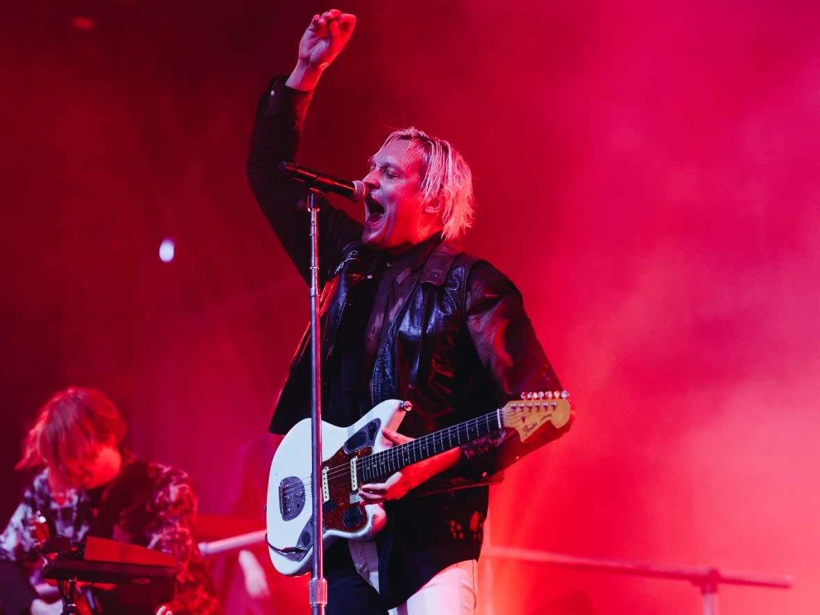 Win Butler of Arcade Fire performs onstage at the 2022 Coachella Valley Music And Arts Festival on April 15, 2022 in Indio, Calif. Butler is facing four sexual misconduct allegations, according to a report in Pitchfork. (Rich Fury/Getty Images/Coachella - image credit)