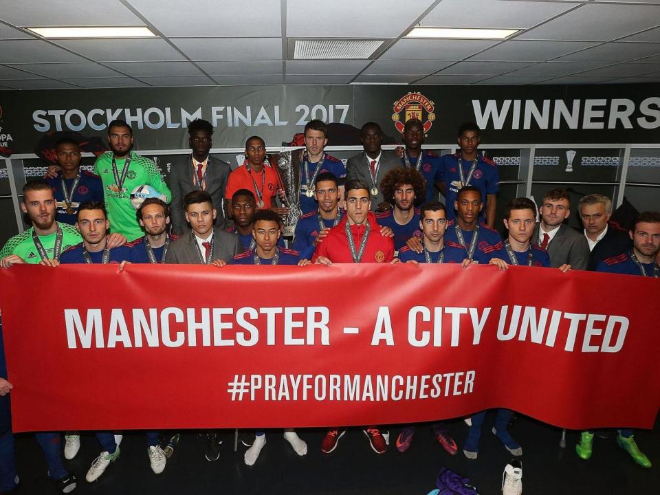 United players in the dressing room after their win (Getty)