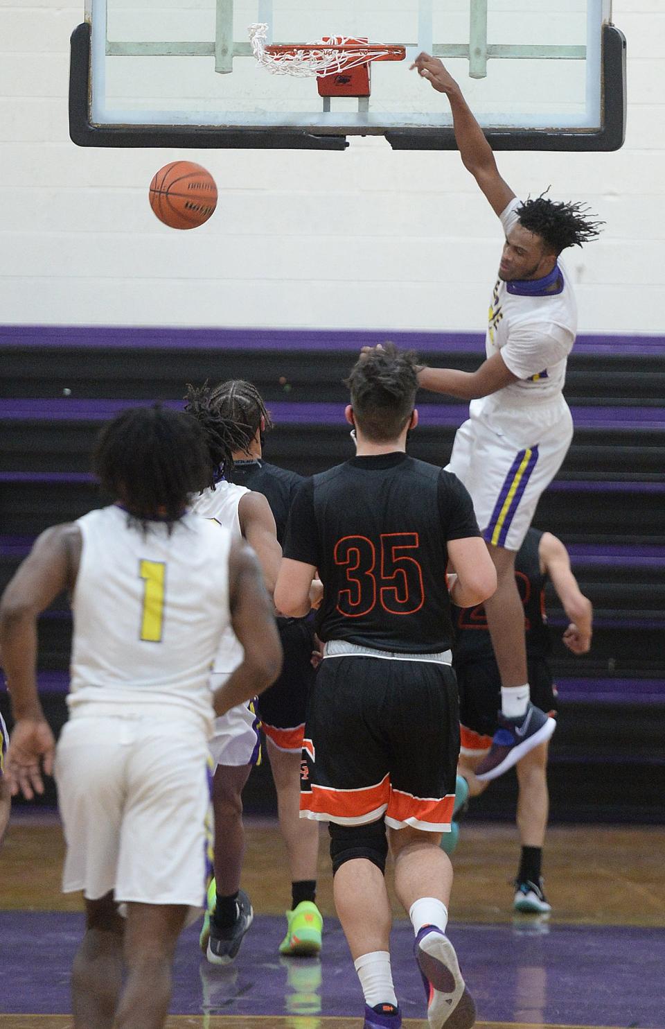 Erie High's Marquell Darnell dunks against Cathedral Prep on Feb. 9, 2021 in the District 10, Region 6 game at Erie High School.