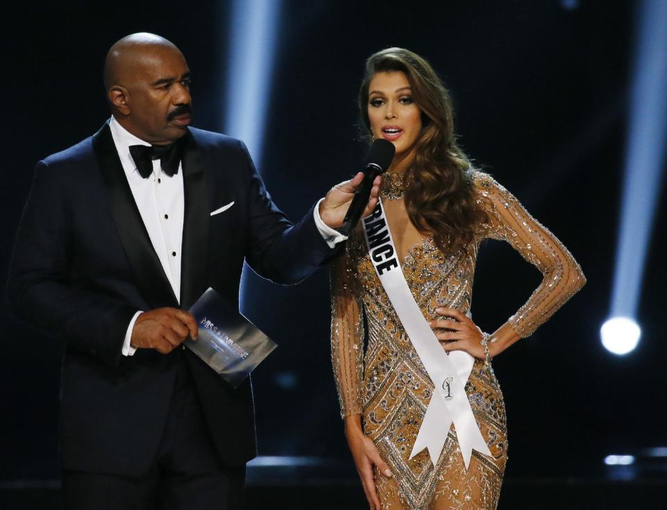 Miss France Iris Mittenaere expounds on her answer during the question-and-answer portion of the Miss Universe 2016 competition Monday, Jan. 30, 2017, at the Mall of Asia in suburban Pasay city, south of Manila, Philippines. Mittenaere won the crown. (AP Photo/Bullit Marquez)