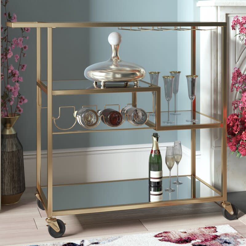 <p><a href="https://go.redirectingat.com?id=74968X1596630&url=https%3A%2F%2Fwww.wayfair.com%2F--%2Fpdp%2Fkelly-clarkson-home--miranda-bar-cart-x211184613-l6412-w005271181.html&sref=https%3A%2F%2Fwww.goodhousekeeping.com%2Fhome-products%2Fg43710917%2Fway-day-kelly-clarkson-wayfair-deals-2023%2F" rel="nofollow noopener" target="_blank" data-ylk="slk:Shop Now;elm:context_link;itc:0;sec:content-canvas" class="link ">Shop Now</a></p><p>Miranda Bar Cart</p><p>wayfair.com</p><p>$219.99</p><span class="copyright">Wayfair</span>