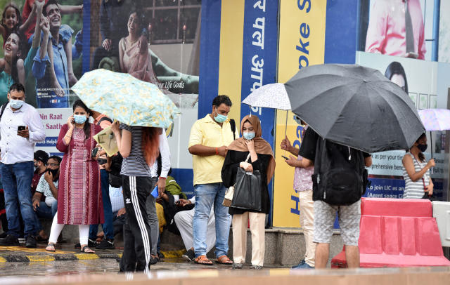 Holding umbrella by self, PM Modi addresses media in rain ahead of monsoon  session of parliament