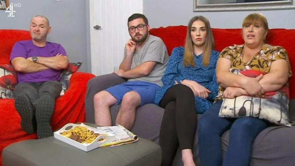 Malone family on sofa