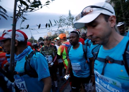 Activist and treegrower Sokomani prepares for the start of the Cape Town marathon