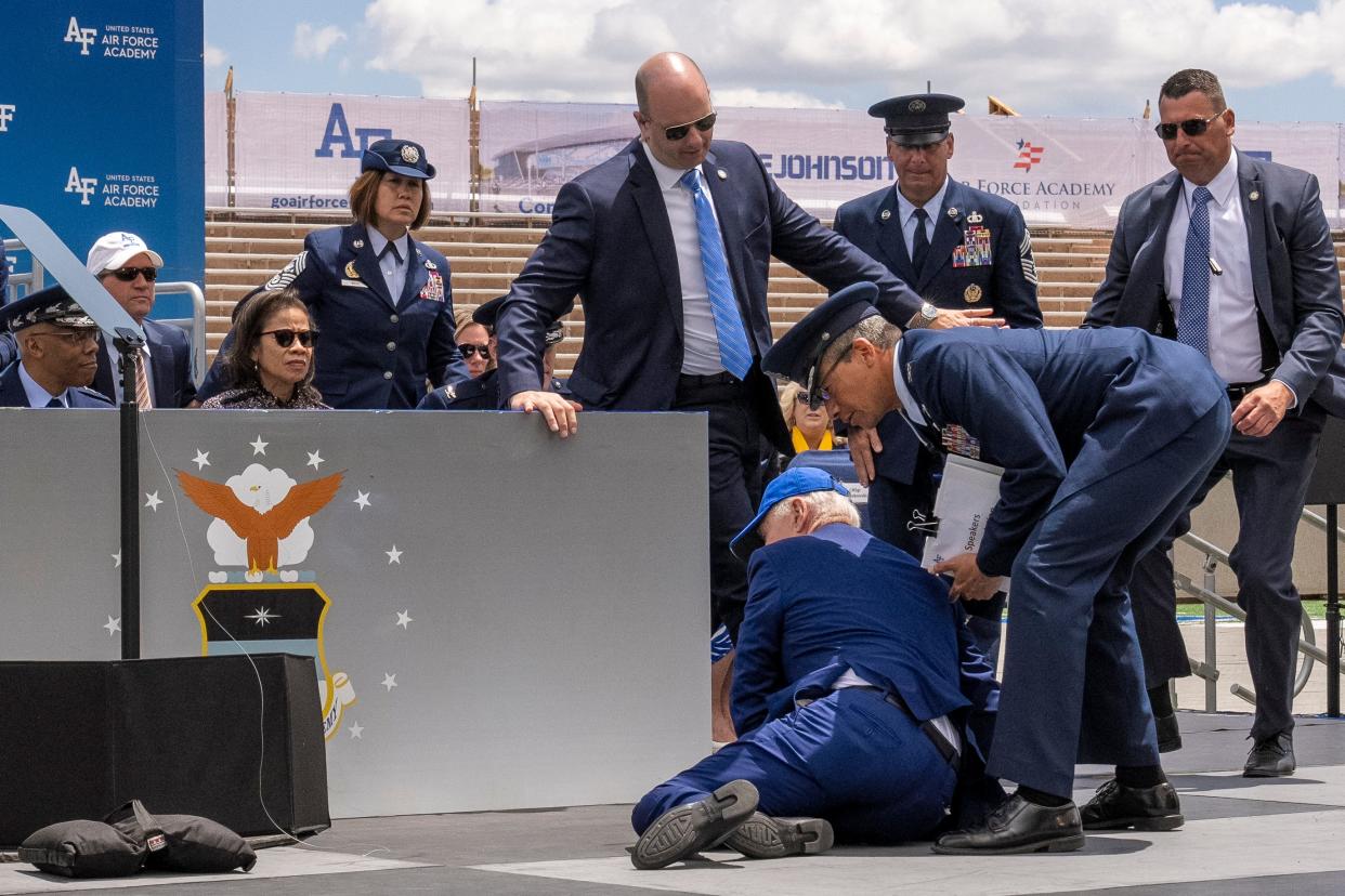 President Joe Biden falls on stage during the 2023 United States Air Force Academy Graduation Ceremony at Falcon Stadium, Thursday, June 1, 2023, at the United States Air Force Academy in Colorado Springs, Colo.