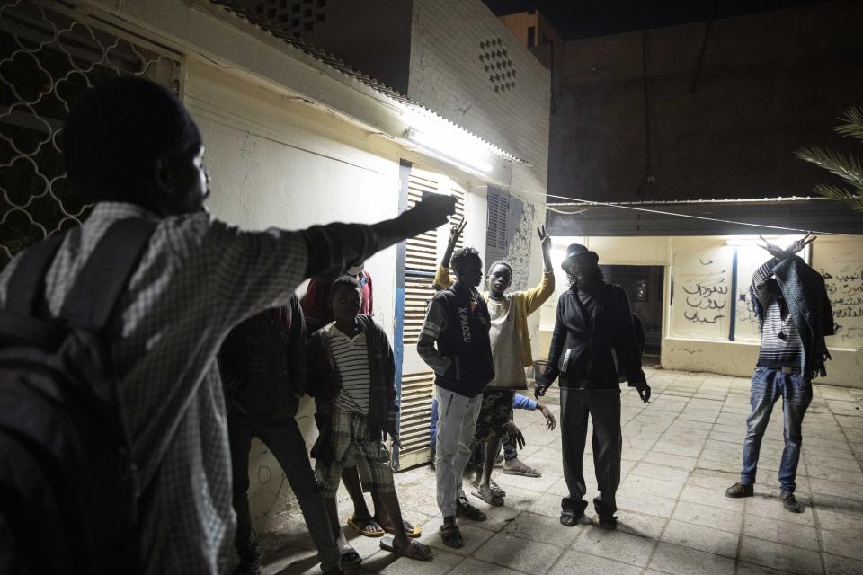 In this Jan. 11, 2020 photo, Sudanese activists hang out and talk about the current political situation, at the Revolutionary Martyrs Center, in Khartoum, Sudan. The young protesters who led the uprising against former President Omar al-Bashir, are now caught in the limbo of the country's fragile interim period. Nearly a year after his ouster, the country faces a dire economic crisis, leaving many young people jobless. Generals remain the de-facto rulers of the country and have shown little willingness to hand over power to a civilian-led administration, one the demonstrators' key demands. (AP Photo/Nariman El-Mofty)