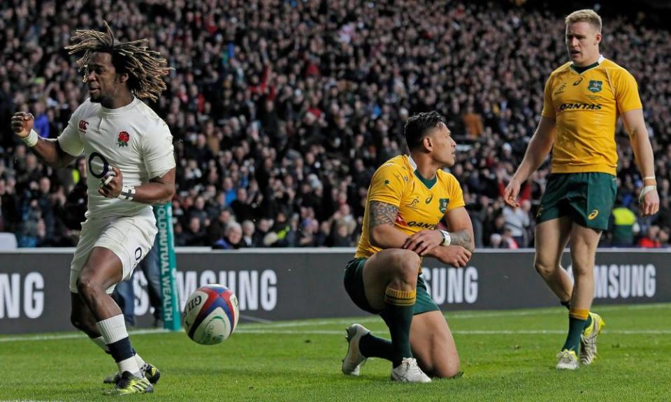 England’s Marland Yarde celebrates beating Israel Folau to the ball to score against Australia after fine buildup play from Jonathan Joseph.