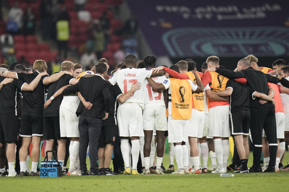 Canada's players and team react at the end of the World Cup group F soccer match between Belgium and Canada, at the Ahmad Bin Ali Stadium in Doha, Qatar, Wednesday, Nov. 23, 2022. Belgium won 1-0. (AP Photo/Hassan Ammar)