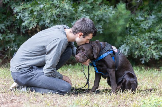 Michael, a veteran, and Oliver, a dog from Operation Delta Dog