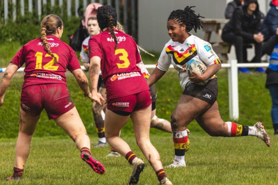 Bradford Telegraph and Argus: Bulls' Beatriz Furtado runs at the Dewsbury Moor defence during her side's away defeat there last month.