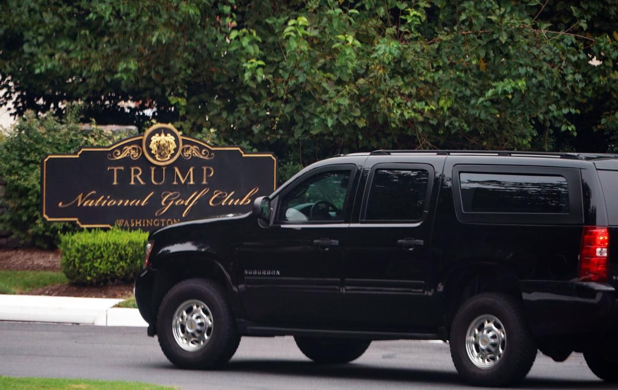 The motorcade carrying President Donald Trump enters the Trump National Golf Club in Sterling, Virginia, on Sept. 8. (Photo: MANDEL NGAN via Getty Images)