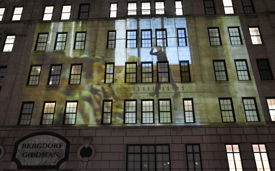 Designer Marc Jacobs during his fall/winter 2021 fashion show is projected on the exterior of Bergdorf Goodman department store on Monday, June 28, 2021, in New York. (Photo by Evan Agostini/Invision/AP)