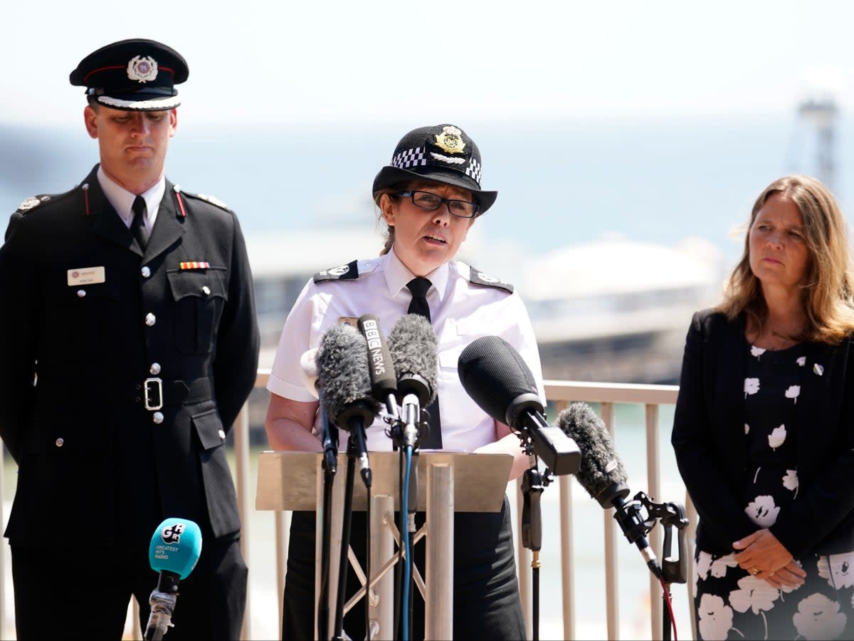 Dorset & Wiltshire Fire And Rescue Assistant Chief Fire Officer Andy Cole, Assistant Chief Constable Rachel Farrell and Vikki Slade, leader of the local council (PA)