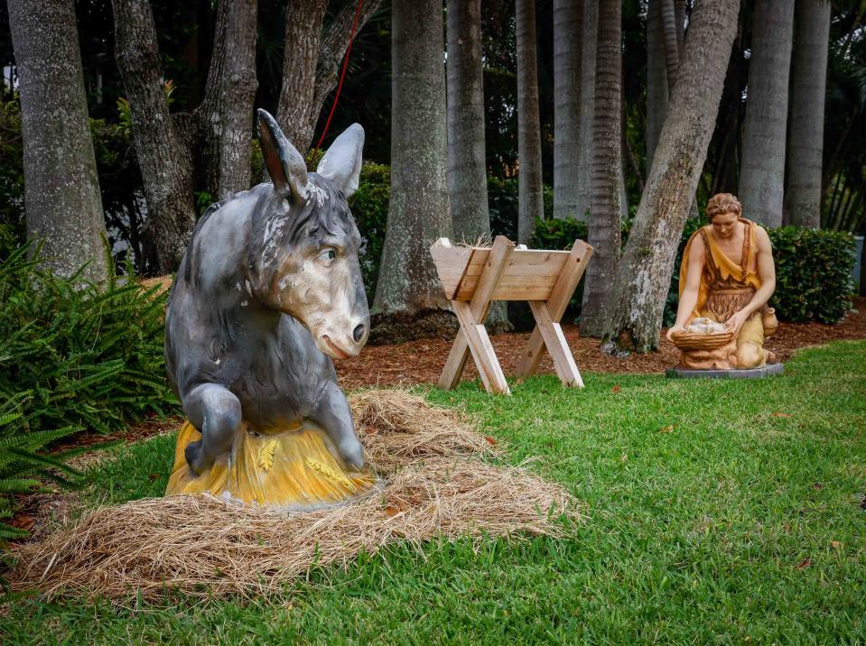 A nativity scene at Royal Poinciana Chapel features a variety of characters from the Christmas story, including Joseph.