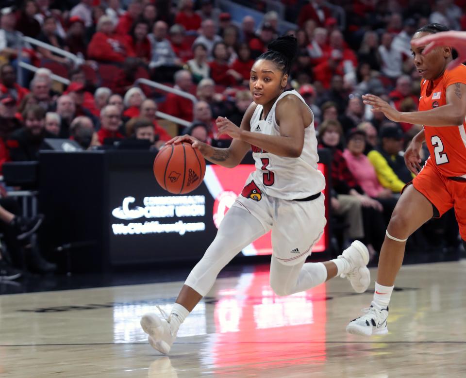Louisville’s Chrislyn Carr bring the ball up court against Syracuse.Dec. 29, 2022