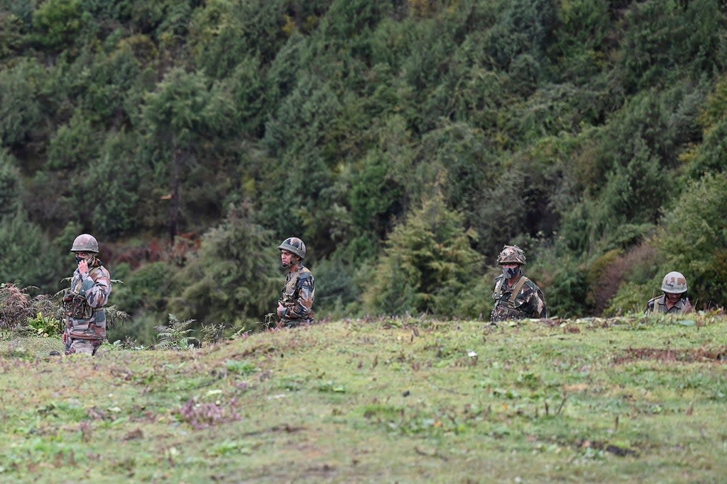 Indian soldiers patrolling in Tawang, Arunachal Pradesh on 20 October 2021 (AFP via Getty Images)