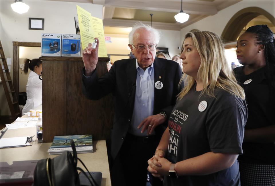 Sanders holds an insulin vial as he talks with Quinn Nystrom at the Olde Walkerville Pharmacy on July 28, 2019, in Windsor, Ontario. Sanders and a busload of insulin patients stopped in Windsor to purchase the drug to highlight its high costs in the U.S. (Photo: ASSOCIATED PRESS)