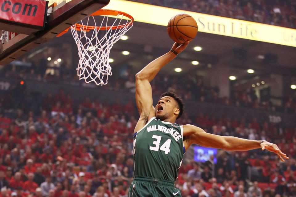 Giannis Antetokounmpo of the Milwaukee Bucks dunks the ball in 2019 playoffs<span class="copyright">Gregory Shamus—Getty Images</span>