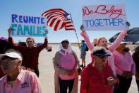 FILE PHOTO: A small group of demonstrators protests outside of the children's tent encampment built to deal with the Trump administrations "zero tolerance" policy in Tornillo, Texas, U.S. June 21, 2018. REUTERS/Mike Blake/File Photo